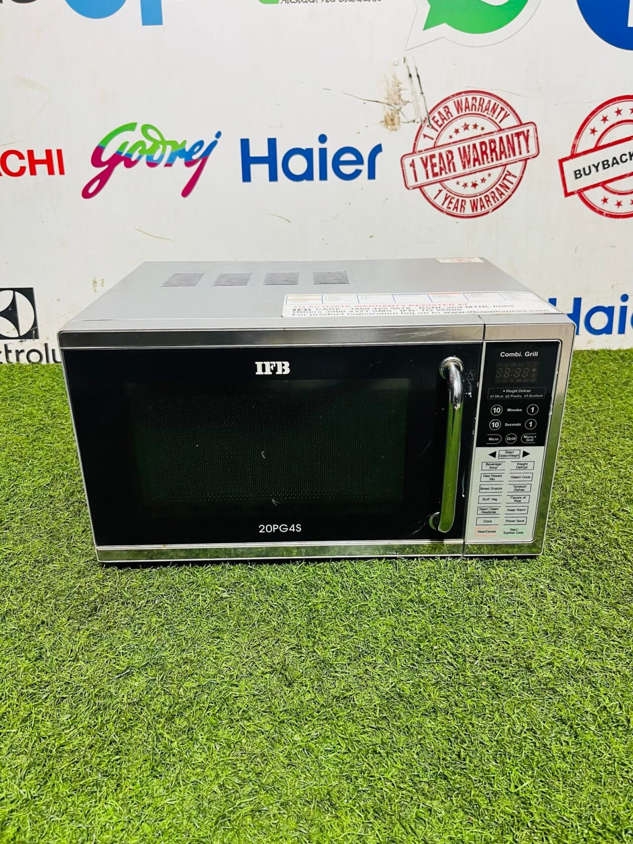 IFB 20PG4S silver and black in colour with micro + grill combi and time display microwave oven