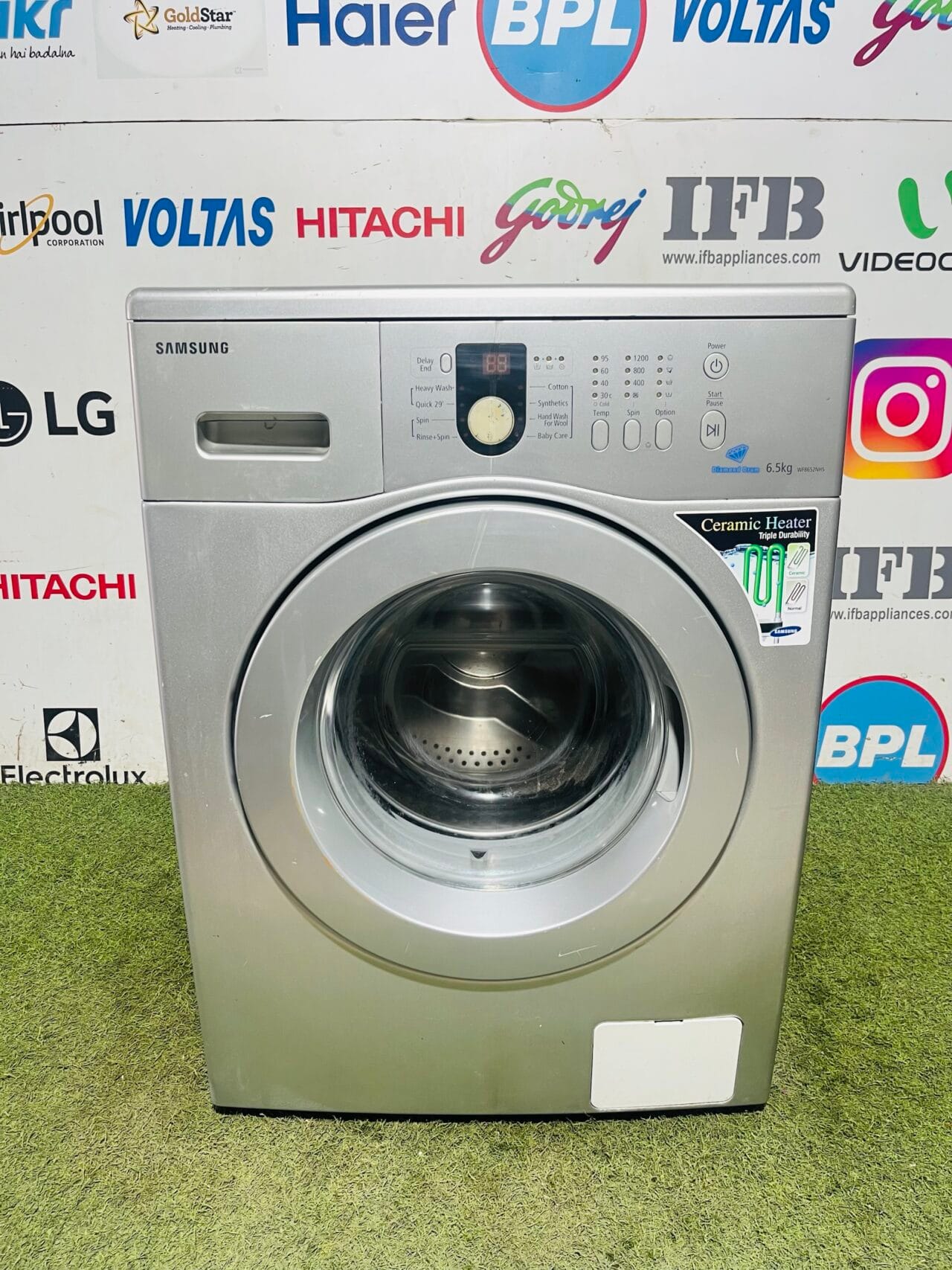 Samsung diamond drum with inbuilt ceramic heater silver in colour 6 kg gently used fully automatic front door washing machine