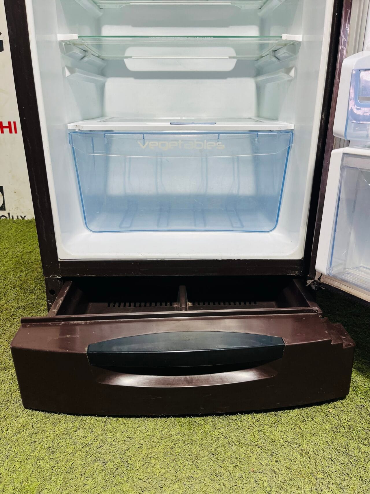 Godrej edge DIGI with frost free mode,turbo chill model and defrost control five star energy rating inbuilt stabiliser gently used with base stand and onion tray 200 ltr flower model single door refrigerator - Image 4