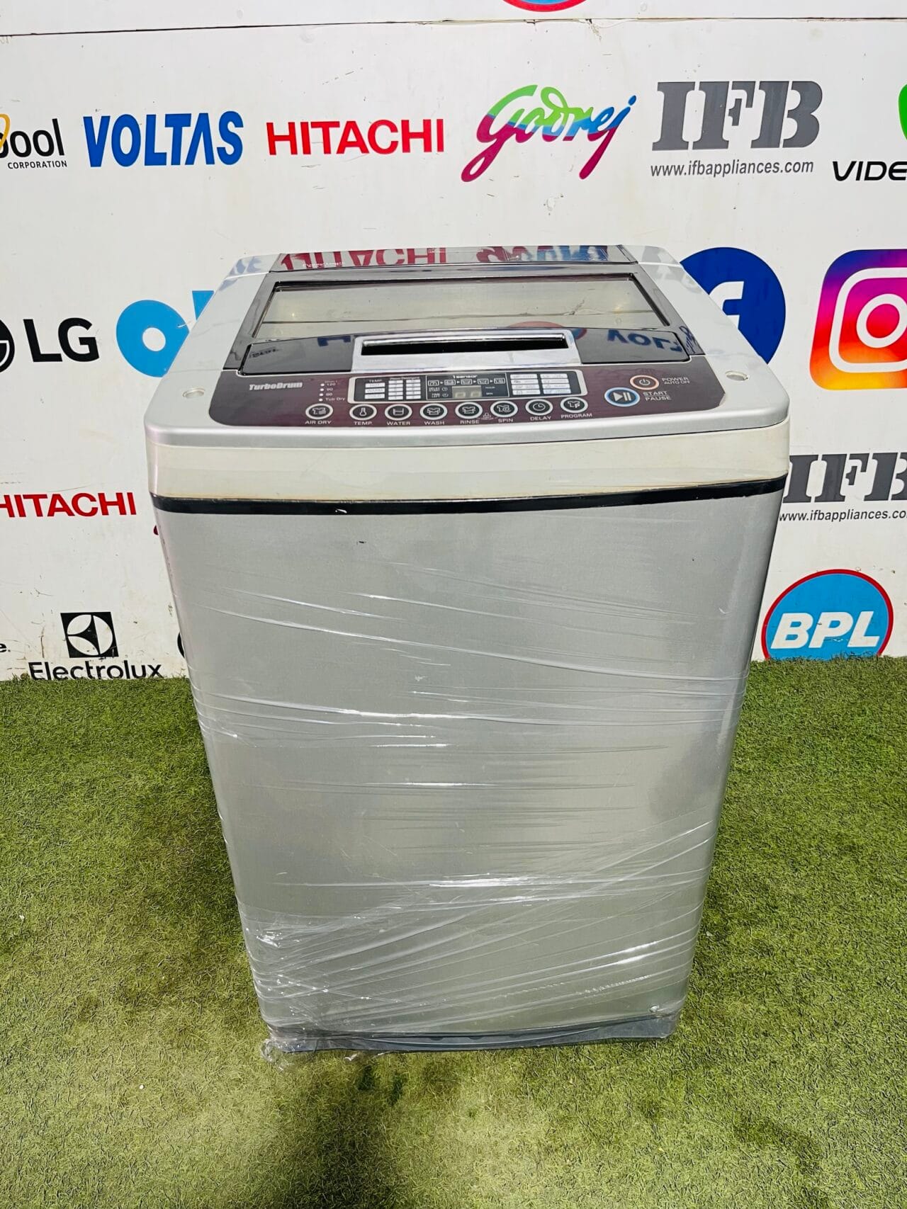 Lg fuzzy logic turbo drum silver in colour with fiber drum 6.5 kg gently used fully automatic top load washing machine