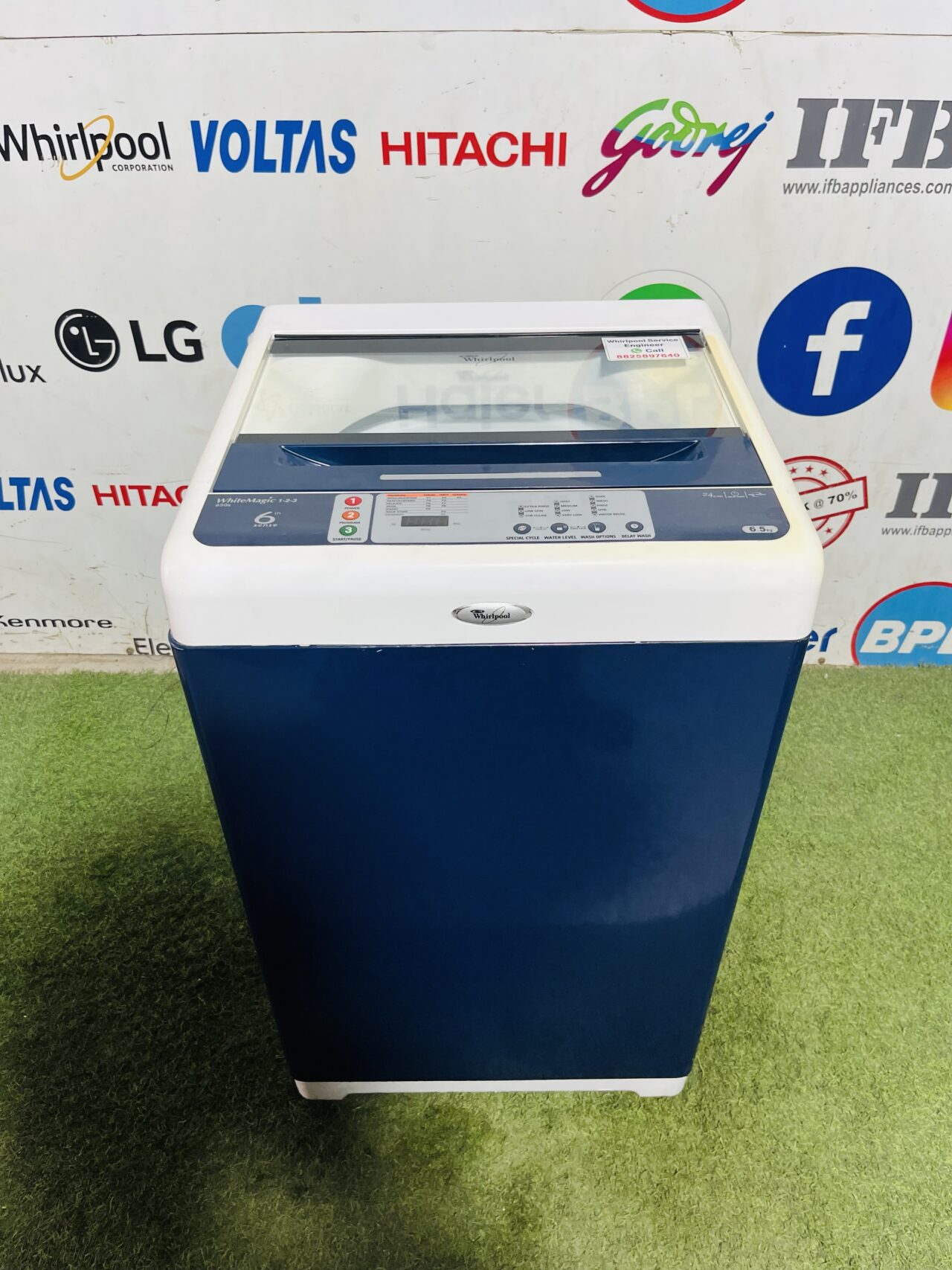 Whirlpool 6th sense white magic 123 white and blue in colour 6.5 kg with auto restart gently used fully automatic top load washing machine