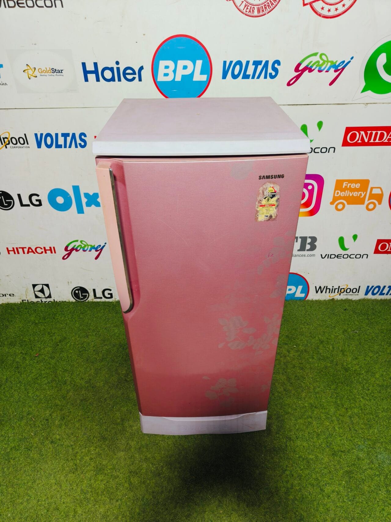 Samsung five star energy rating inbuilt stabiliser pink flower model 190 lte with base stand and onion tray gently used single door refrigerator - Image 2