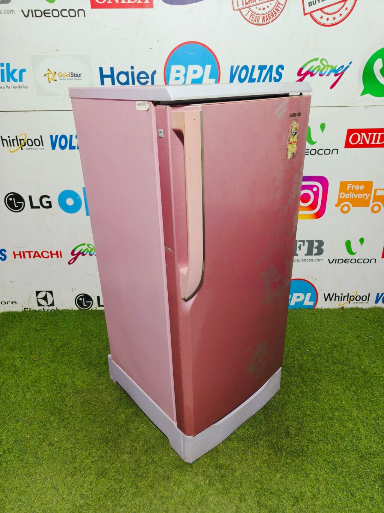 Samsung five star energy rating inbuilt stabiliser pink flower model 190 lte with base stand and onion tray gently used single door refrigerator - Image 4
