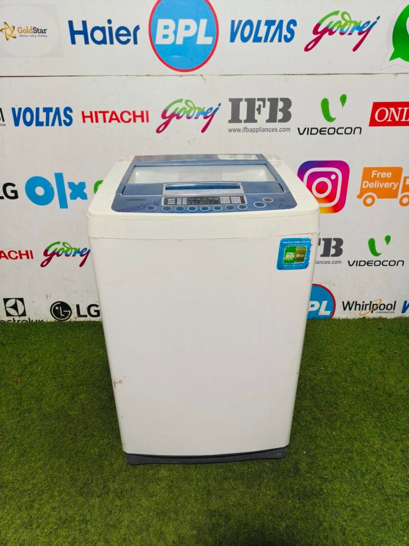 LG fuzzy logic turbo drum 6.5 kg gently used white and blue in colour fully automatic top load washing machine