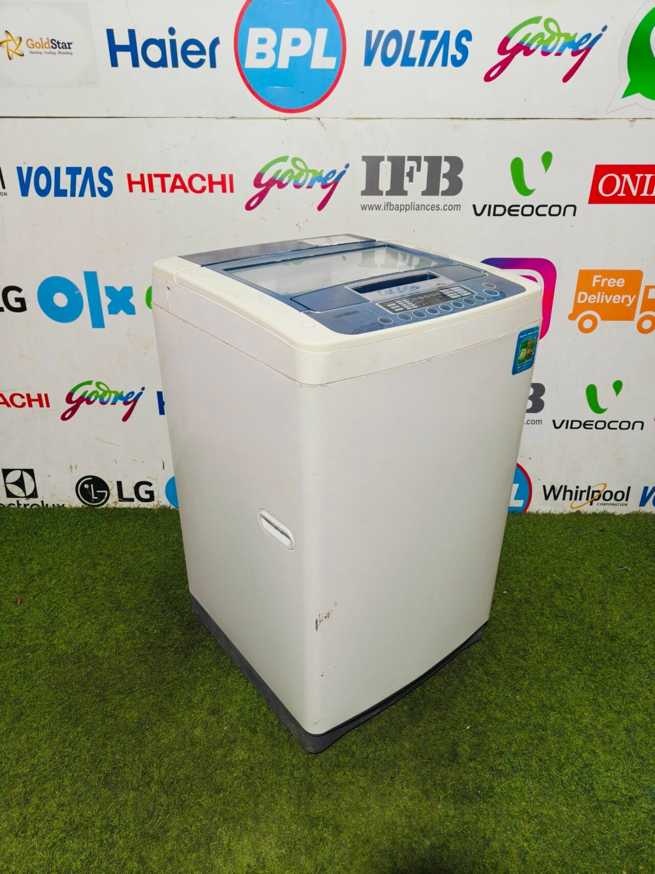 LG fuzzy logic turbo drum 6.5 kg gently used white and blue in colour fully automatic top load washing machine - Image 4
