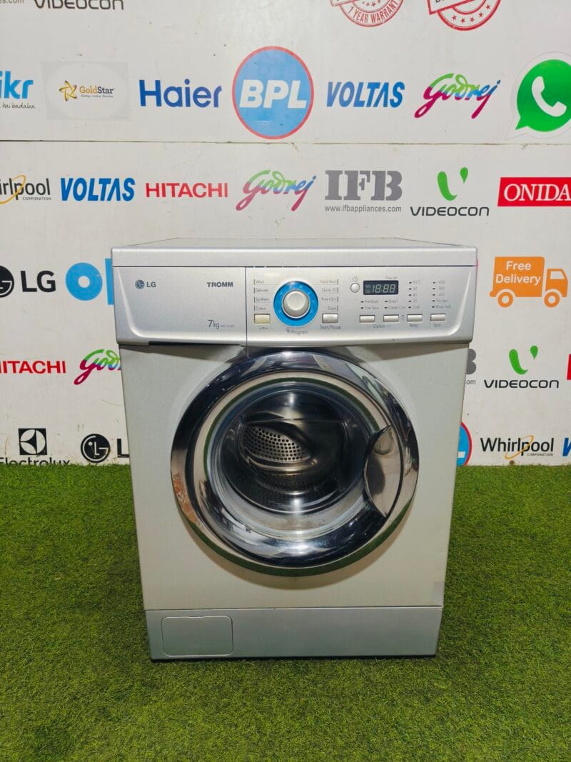 LG tromm silver in colour 7 kg fully automatic front load gently used washing machine