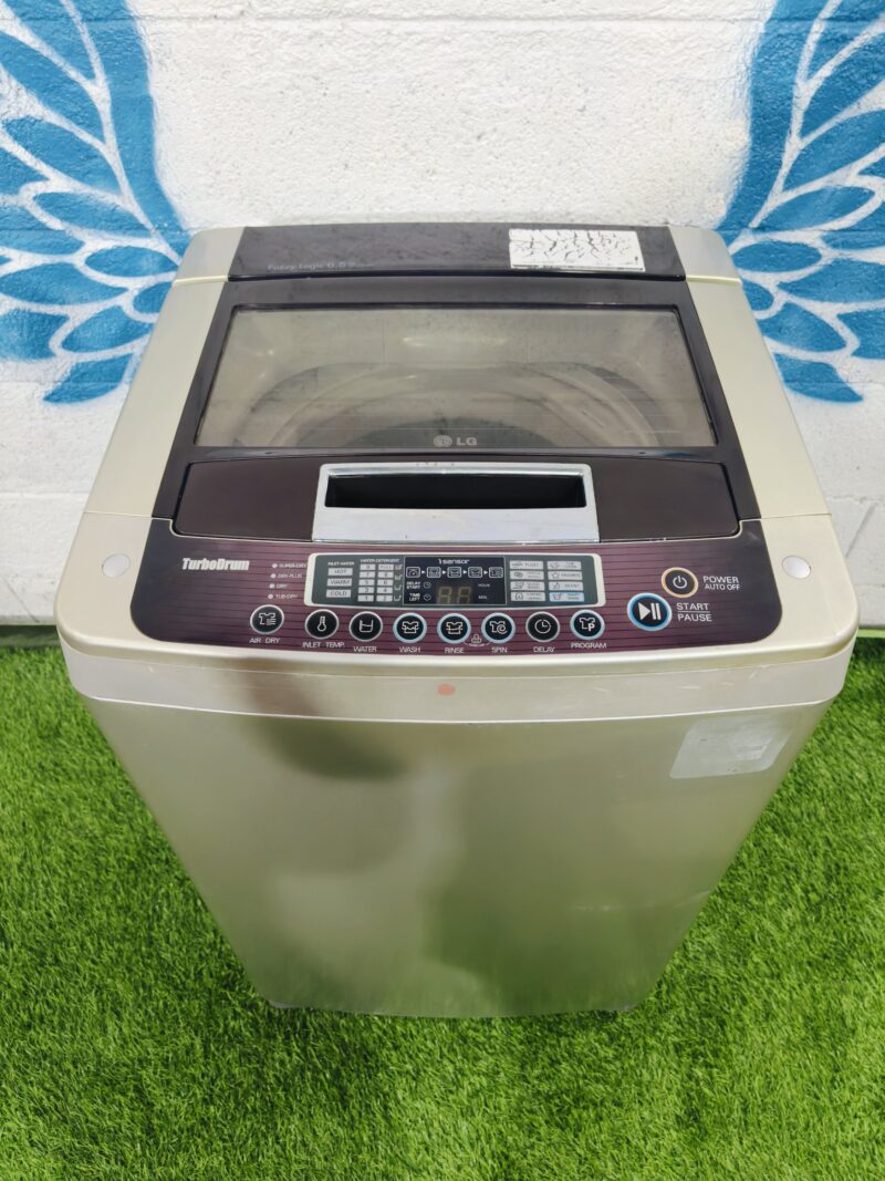 LG fuzzy logic turbo drum 6.5 kg used fully automatic top load washing machine
