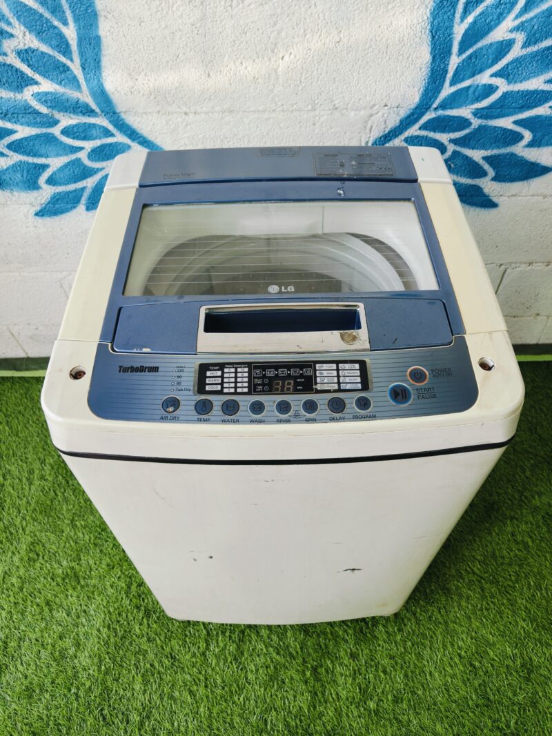 LG turbo drum white and blue in colour 6.5 kg Fully automatic top load washing machine