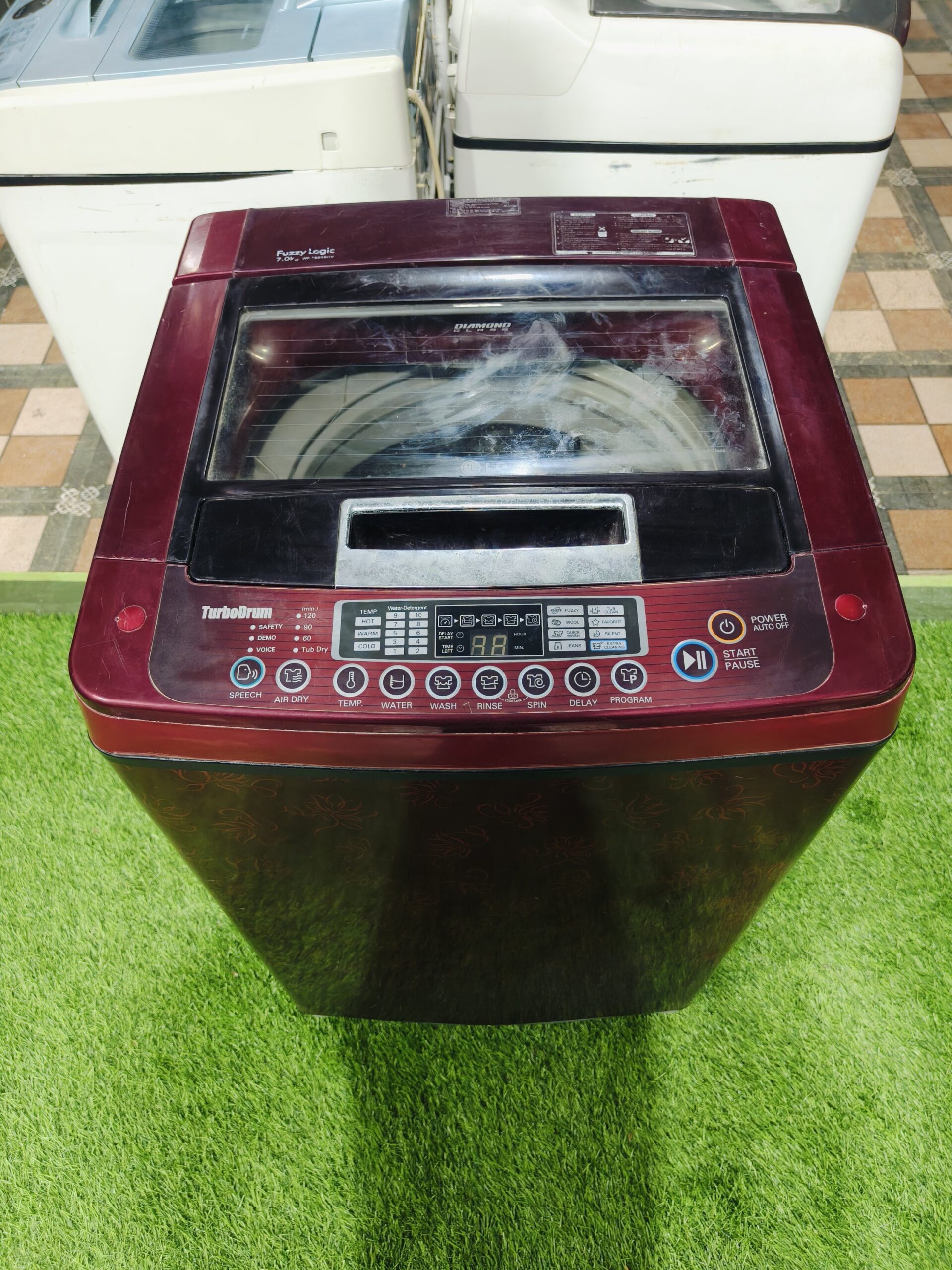 LG fuzzy logic turbo drum 7 kg red flower model gently used fully automatic top load washing machine - Image 2