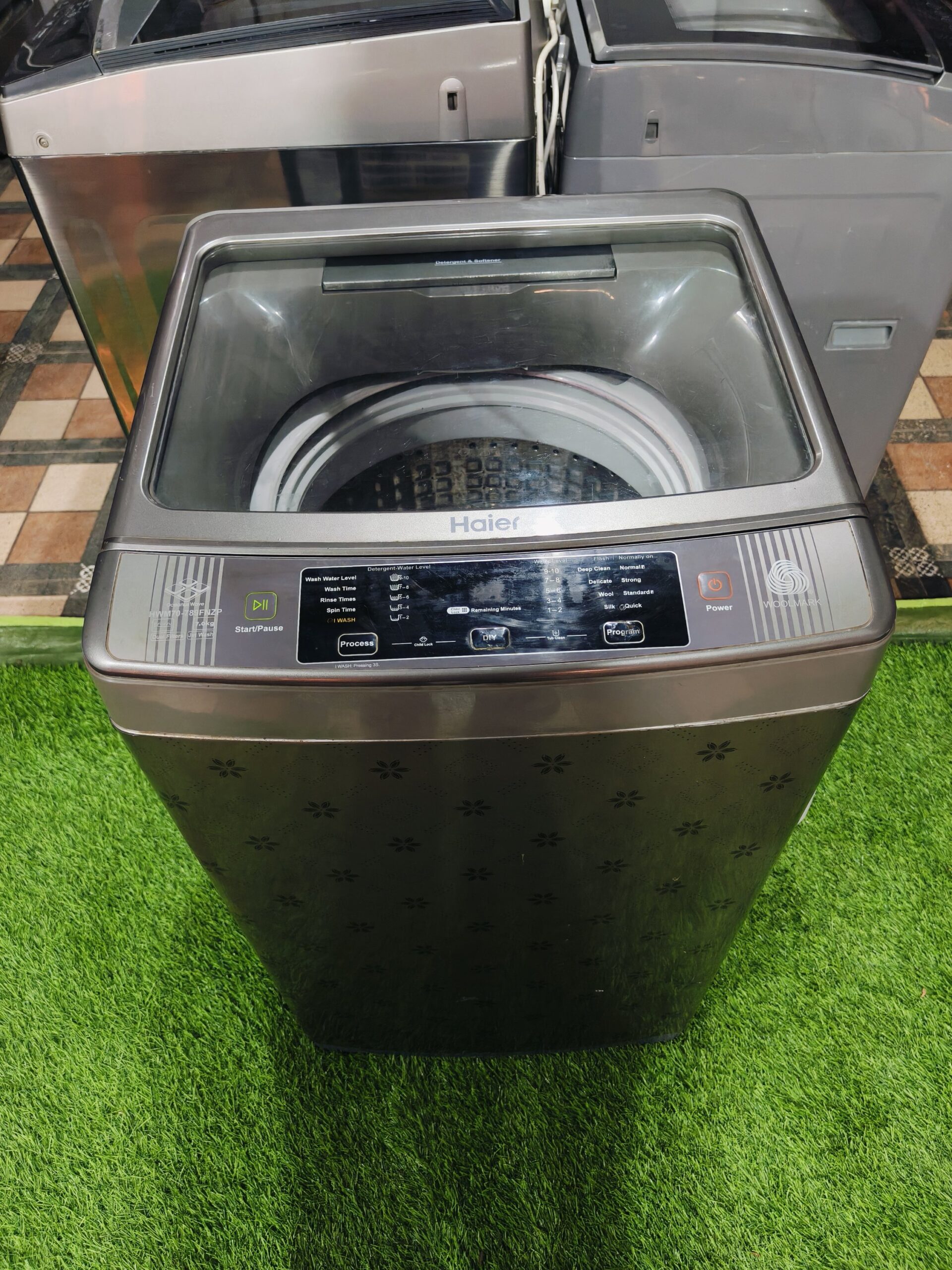 Haier woolmark jet wash 7 kg fully automatic gently used top load flower model washing machine