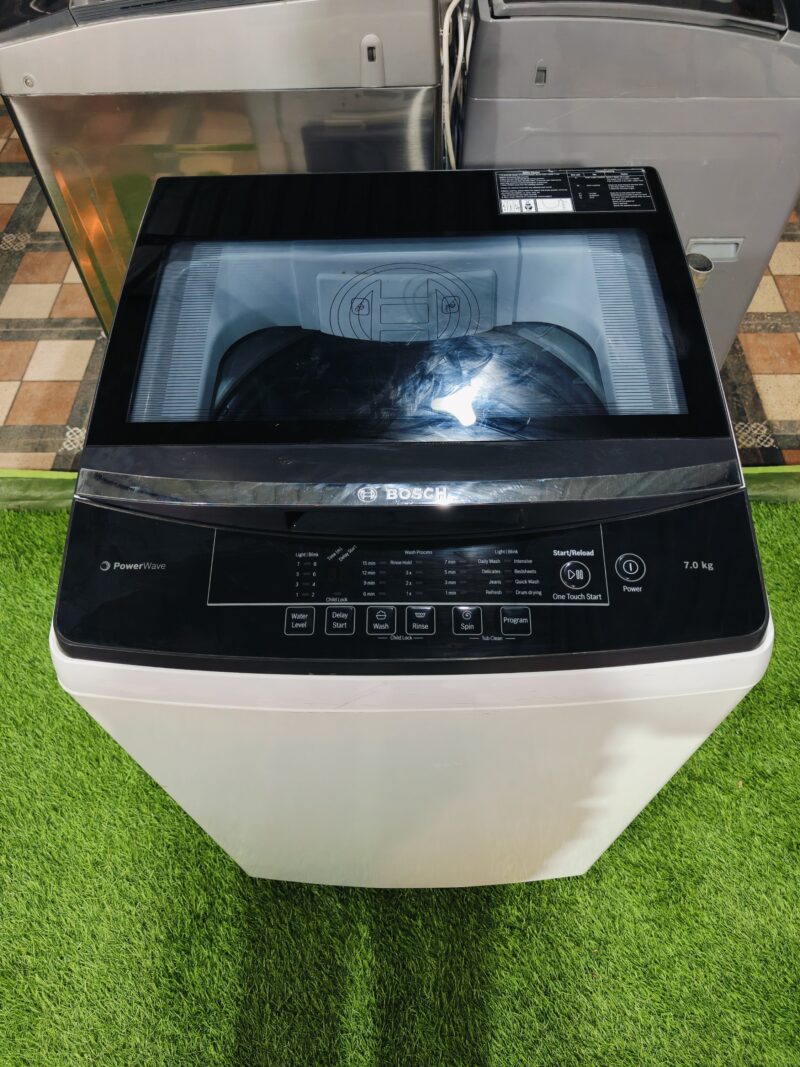 Bosch power wave 7 kg white & black in colour gently used fully automatic top load washing machine