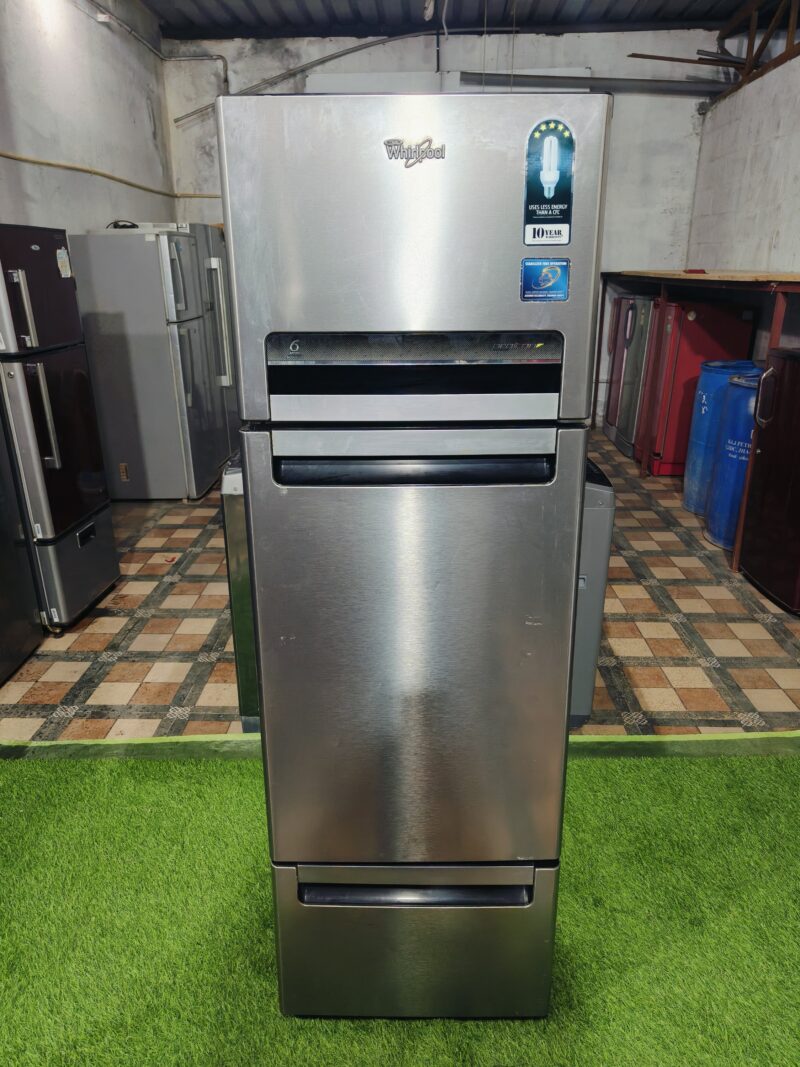 Whirlpool 6th sense proton silver & black in colour 330 ltr gently used triple door refrigerator
