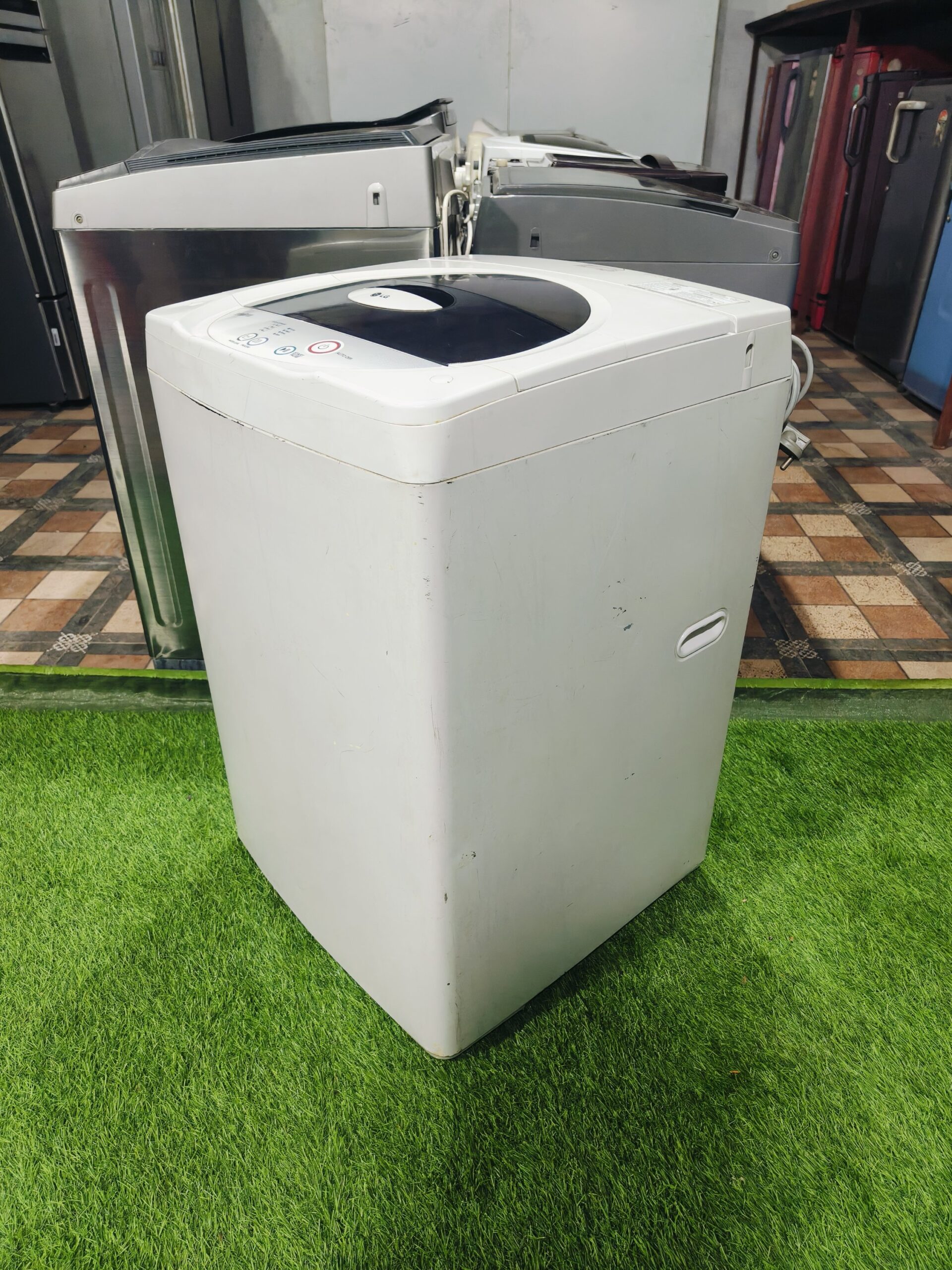 LG fuzzy logic turbo drum 5.8 kg fully automatic top load washing machine - Image 4