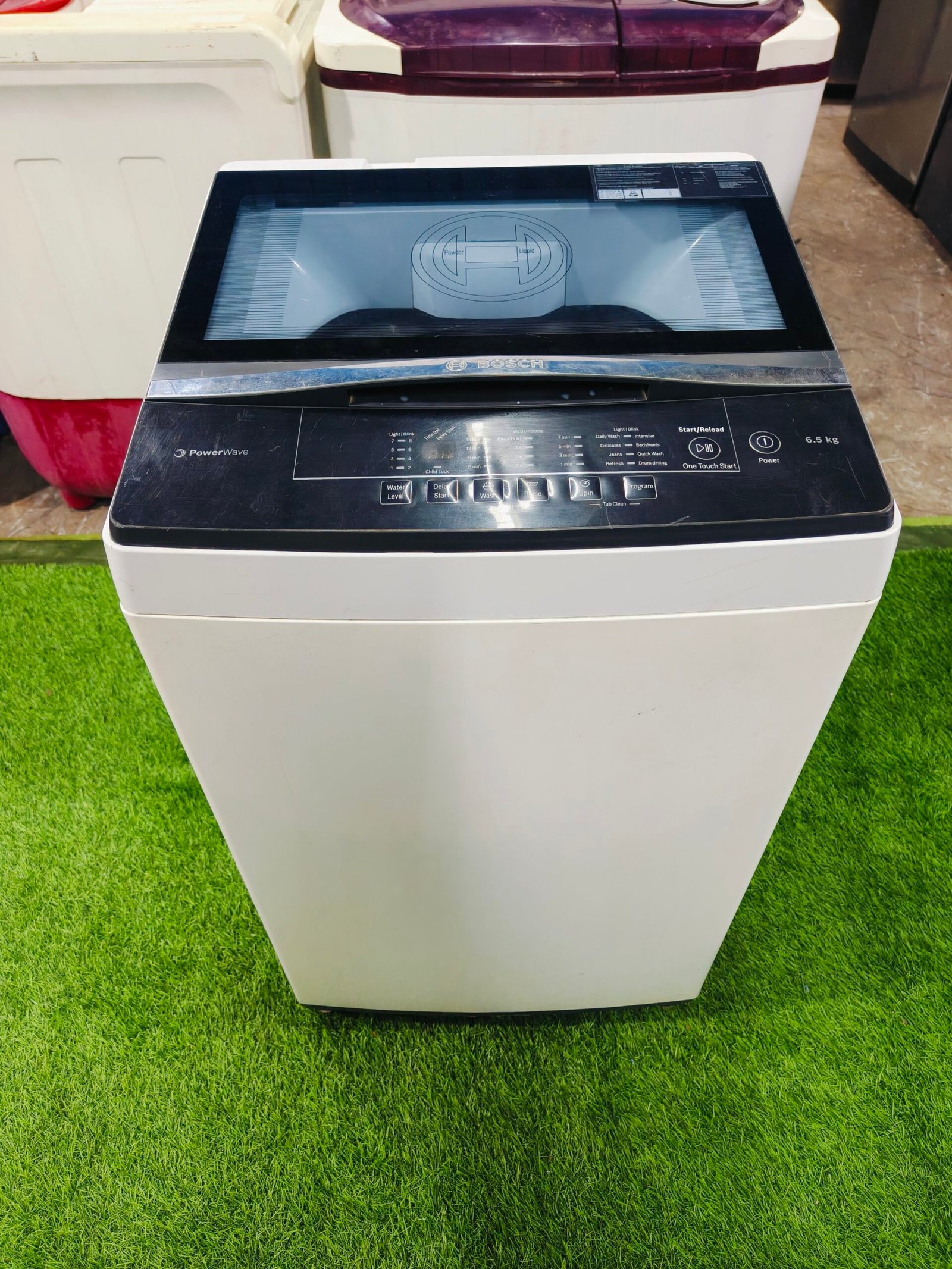 Bosch power wave 6.5 kg white & black in colour gently used fully automatic top load washing machine