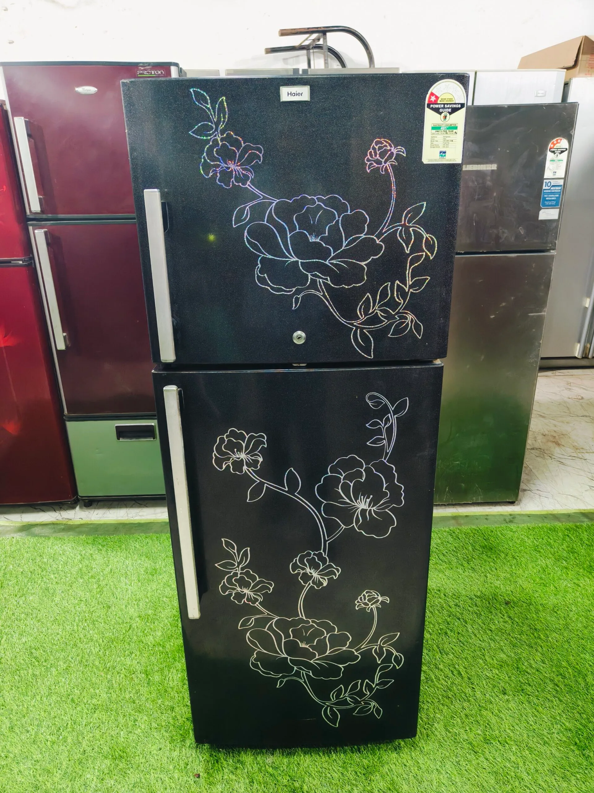Haier multi colour flower model 240 ltr double door refrigerator