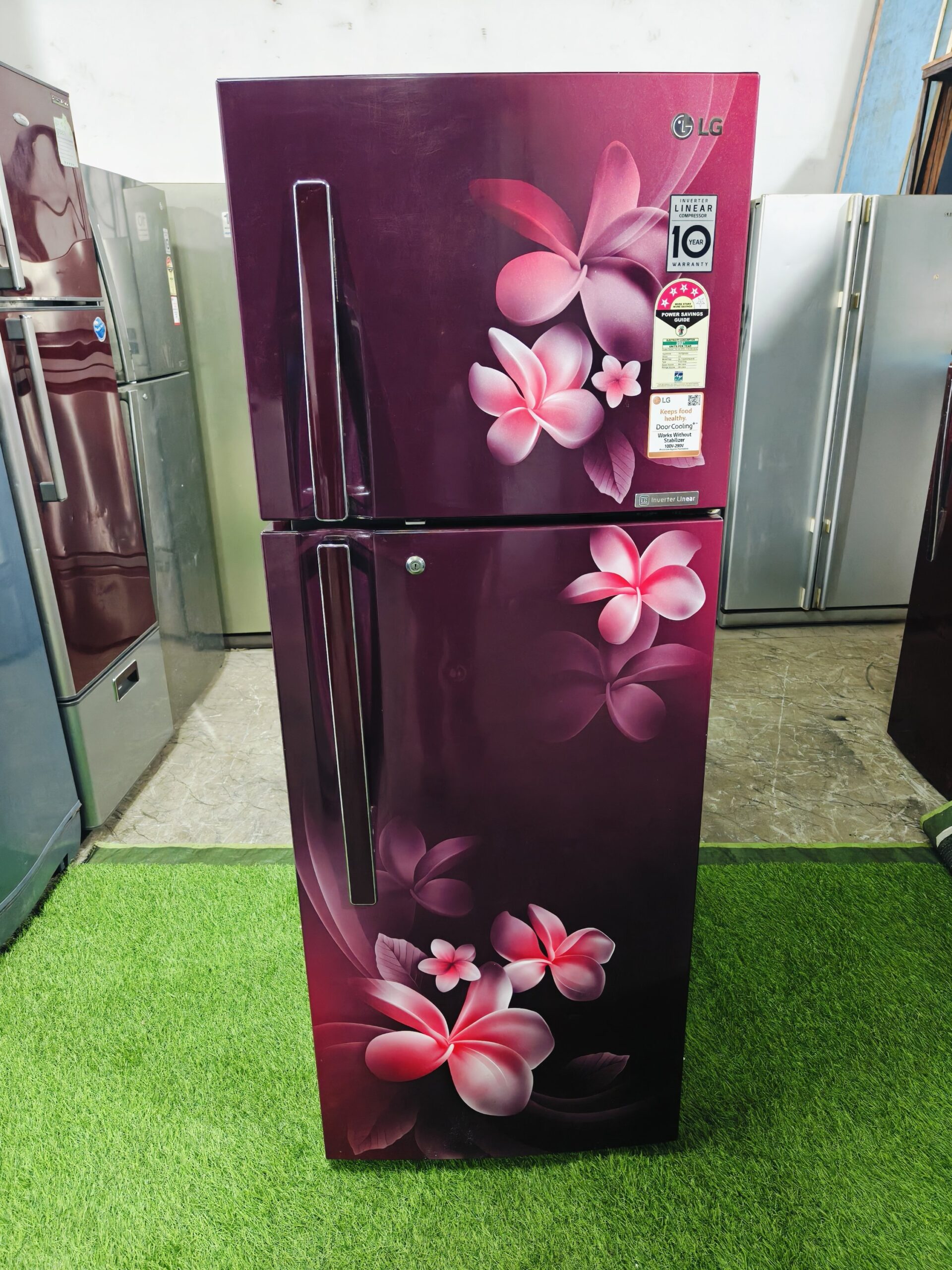 LG 4 star energy rating linear inverter with pink flower model 260 ltr gently used double door refrigerator
