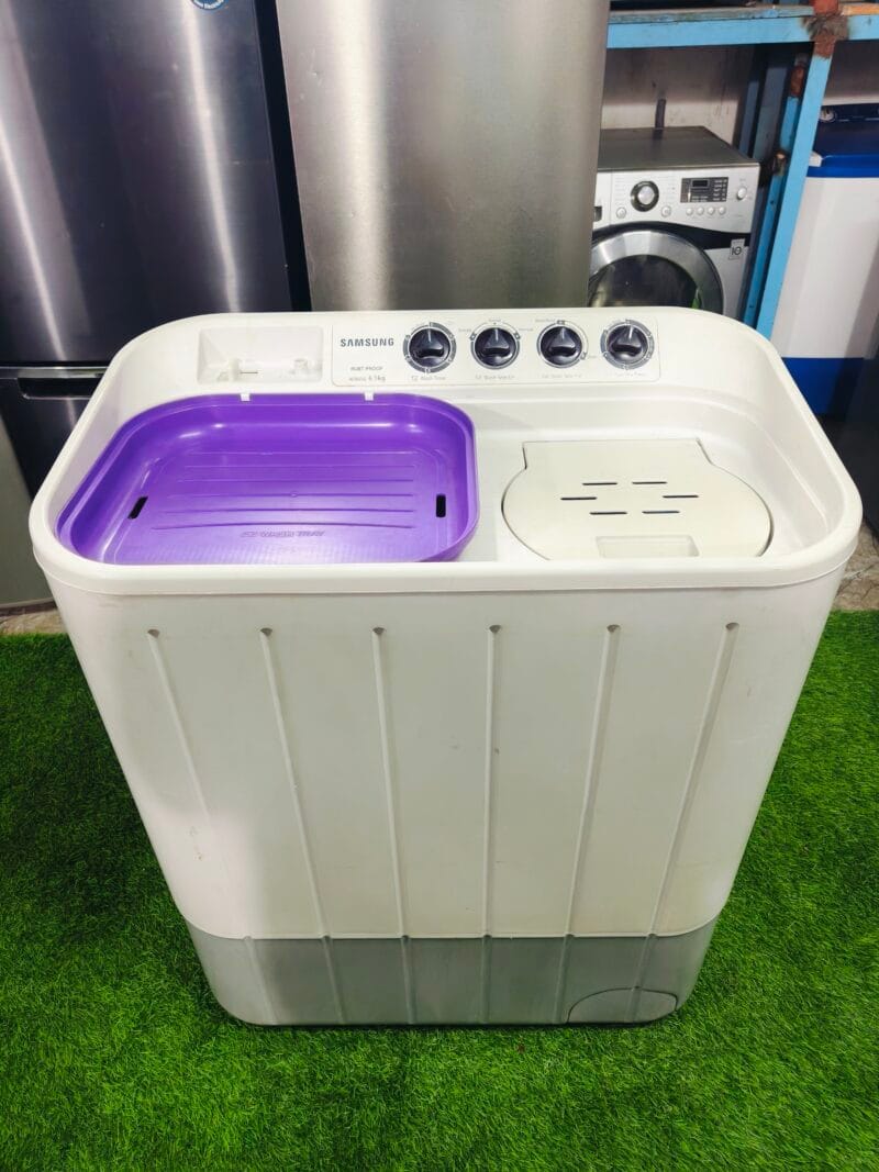 Samsung rust proof 6.5 kg white and purple in colour gently used semi-automatic washing machine