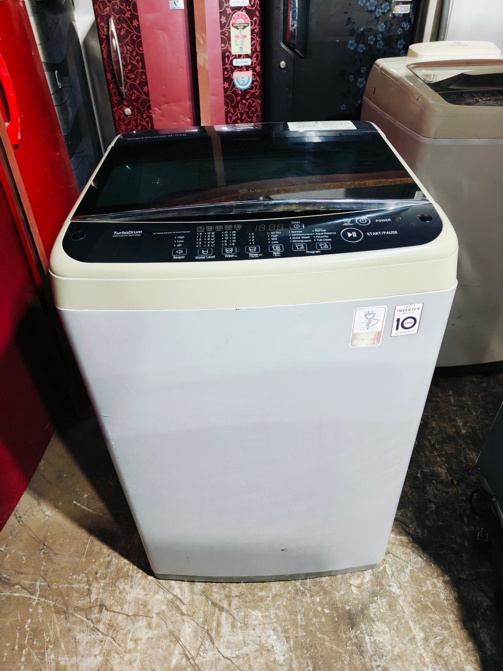 LG smart inverter turbo drum with inverter technology 6.5 kg double colour gently used fully automatic top load washing machine - Image 2